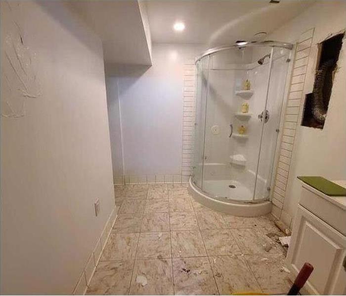 repaired storm damaged shower area